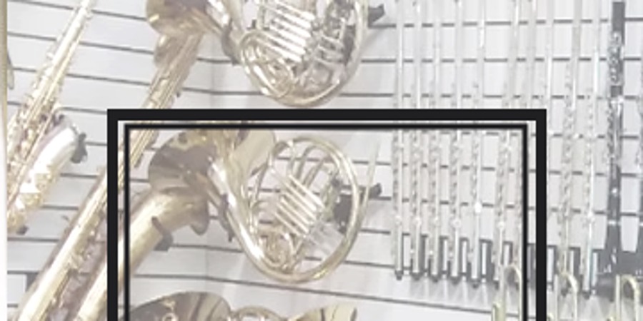 Horns displayed inside Rocky Mountain Music Repair